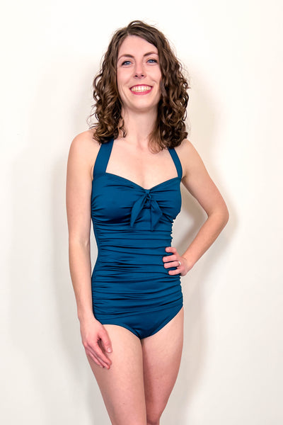 Beautiful One Piece Swimsuit in teal with flattering front ruching. Tummy flattering swimsuit. Supportive One piece swimsuit